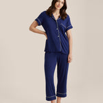 Front view of Papinelle Kate Modal Crop PJ Set in navy, showing button-up top with piping and cropped pants with drawstring waist.