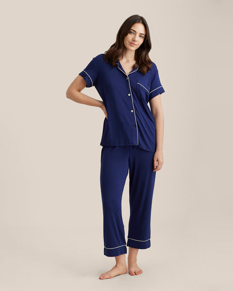 Front view of Papinelle Kate Modal Crop PJ Set in navy, showing button-up top with piping and cropped pants with drawstring waist.