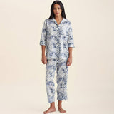 Front view of Papinelle Toile De Jouy Crop PJ Set in cotton print, featuring button-up shirt and cropped pants with drawstring waist.