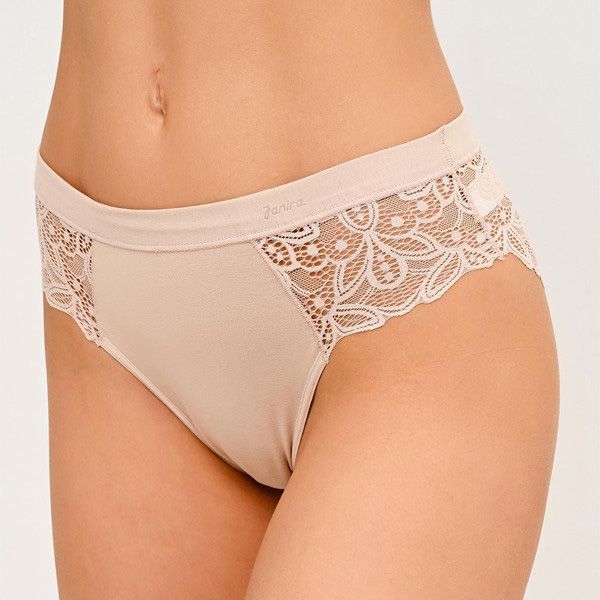 Side angle of Janira’s Belle Cotton Milano Brief in Dune with mid/high cut leg and seamless finish, ideal for invisible wear under clothing.