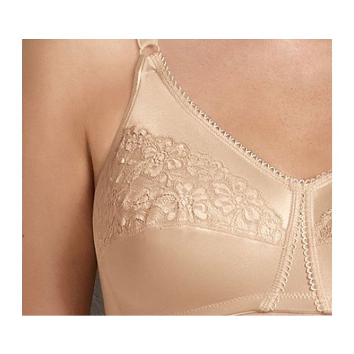 Close-up of Anita Livia Wirefree Mastectomy Bra Haut, highlighting upper cup lace, glossy fabric, and cotton breast form pocket at The Foundation.