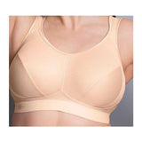 Close-up of Anita Extreme Control Sports Bra Desert Nude, showing seamless cups and supportive microfibre band from The Foundation.