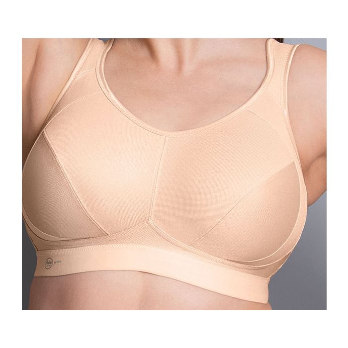 Close-up of Anita Extreme Control Sports Bra Desert Nude, showing seamless cups and supportive microfibre band from The Foundation.