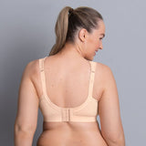 Side and back angle of Anita Extreme Control Sports Bra Desert Nude, displaying breathable mesh back and smooth fit at The Foundation.