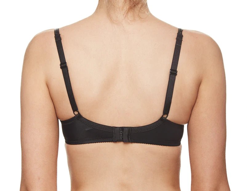 Back view of the Basic Invisible Bra from The Foundation, showing adjustable straps and seamless finish in timeless black.