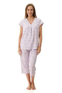 Front view of Givoni Hope Capri Pyjama in pink floral bamboo blend, showing V-neck top and matching capri pants with pockets.