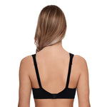 Back view of The Foundation Susa Cotton Comfort Bra in Black, featuring hook-and-eye closure and wide padded straps for extra comfort.