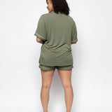 Back view of the olive Cyberjammies set showing relaxed silhouette and elasticated waistband.