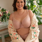 Samanta Amelia Full Cup Side Support Bra Rose, plus-size model seated, full bust bra with delicate German lace, luxury lingerie at The Foundation.