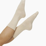 The Foundation’s brushed bamboo bed socks in natural—super soft and breathable bamboo blend for cosy, all-day comfort and winter warmth.