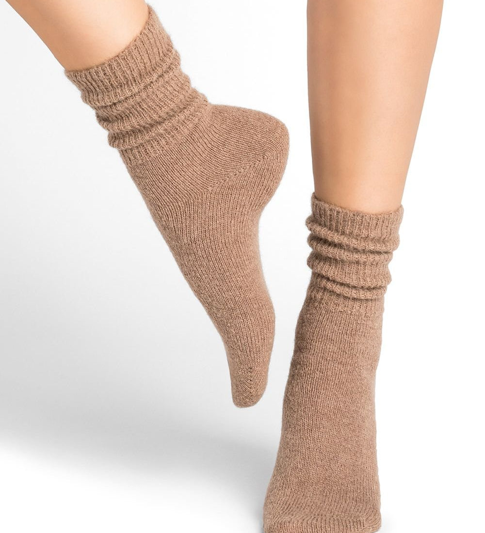Bleuforêt Alpaca Wool Socks in Chamois brown worn mid-calf, with ribbed finish and cosy French-made warmth, from The Foundation.