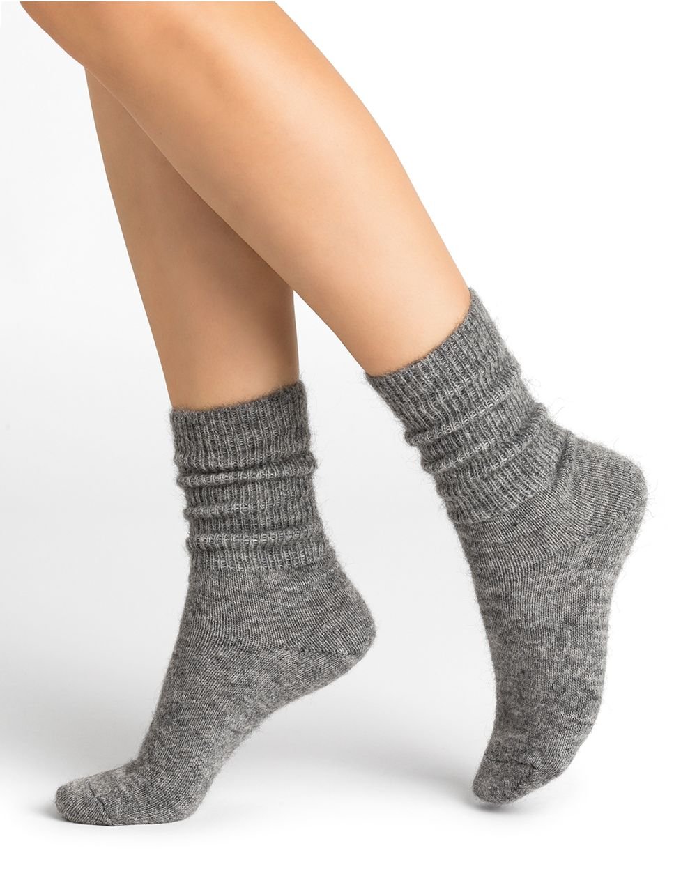 Bleuforêt Alpaca Wool Socks in Gris Moyen grey worn mid-calf with ribbed knit and reinforced heel, available at The Foundation.