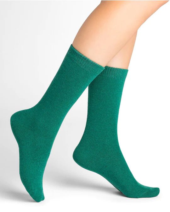 Bleuforêt Wool Cashmere Socks in Menthe green worn mid-calf, showing soft, breathable knit ideal for winter comfort, from The Foundation.
