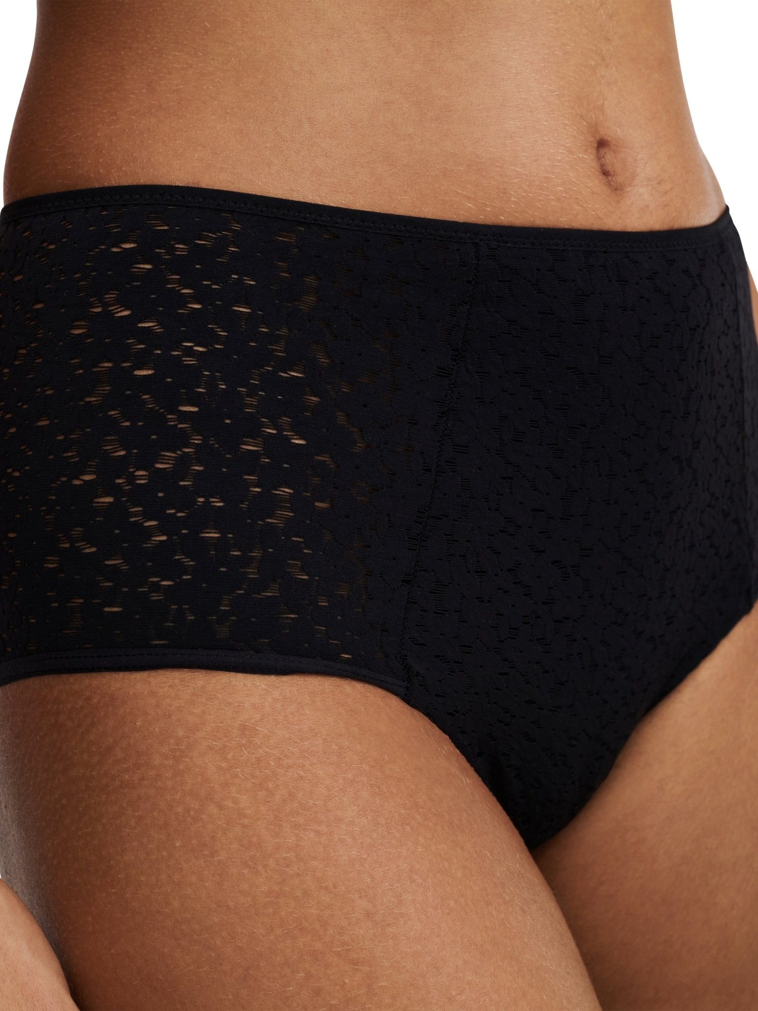 Close-up of floral lace pattern and opaque knit on Norah High Waist Covering Brief Black, featured at The Foundation.