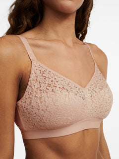 Side view of The Foundation’s Norah Wirefree Support Bra in Golden Beige with delicate floral lace and soft moulded finish.