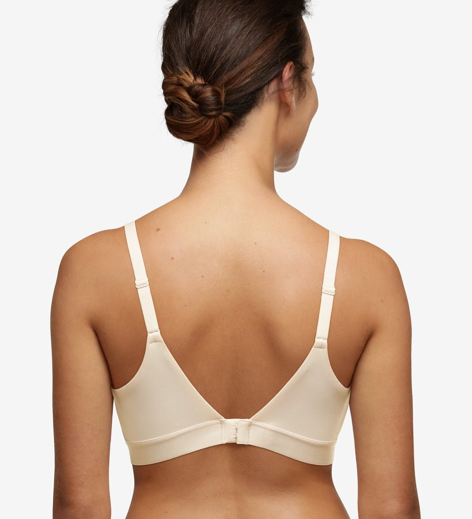 Back view of Chantelle Norah Wirefree Support Bra Pearl on model, showing smooth band and adjustable straps, from The Foundation.
