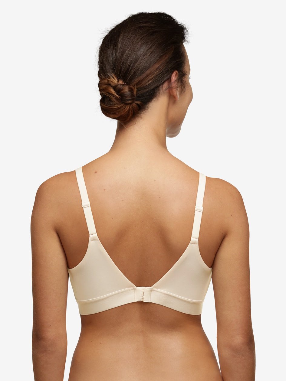 Back view of Chantelle Norah Wirefree Support Bra Pearl on model, showing smooth band and adjustable straps, from The Foundation.