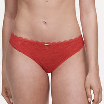 Front view of Chantelle Waltz Tanga in Poppy Red – floral lace mid-rise thong – The Foundation