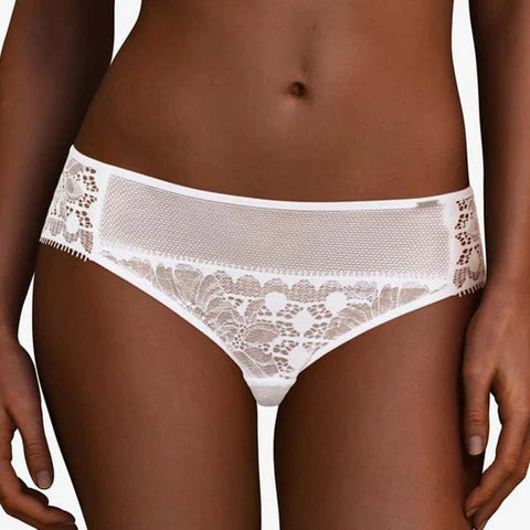 The Foundation’s Day To Night Brief in White—elegant mesh-lined lace bikini with a flattering mid-rise fit for everyday comfort.