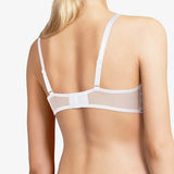 Back view of Day to Night Half Cup Bra by Chantelle in White, tulle-lined straight band with adjustable straps.
