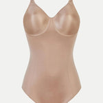 Chantelle Hedona Bodysuit Nude laid flat, showing sleek silhouette and allover nude colour, shapewear exclusive to The Foundation.