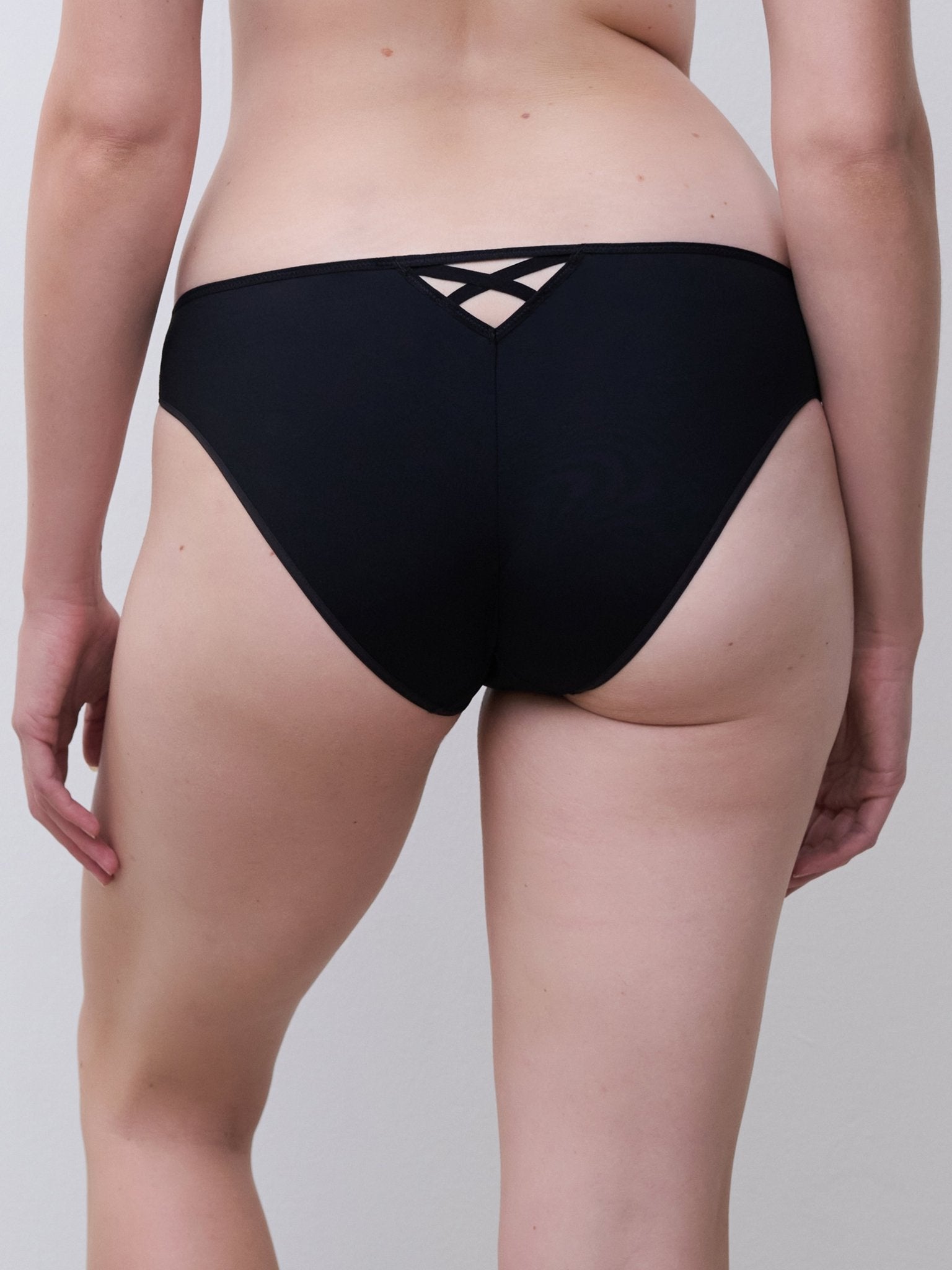Back view of Chantelle Lush Bikini Brief Black/Soft Pink, back view, sheer lace panel, elegant designer underwear by Chantelle Pulp.