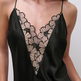 Close-up of graphic floral lace trim on Chantelle Pulp Lush Nightdress Black/Soft Pink, luxurious eco satin nightdress.