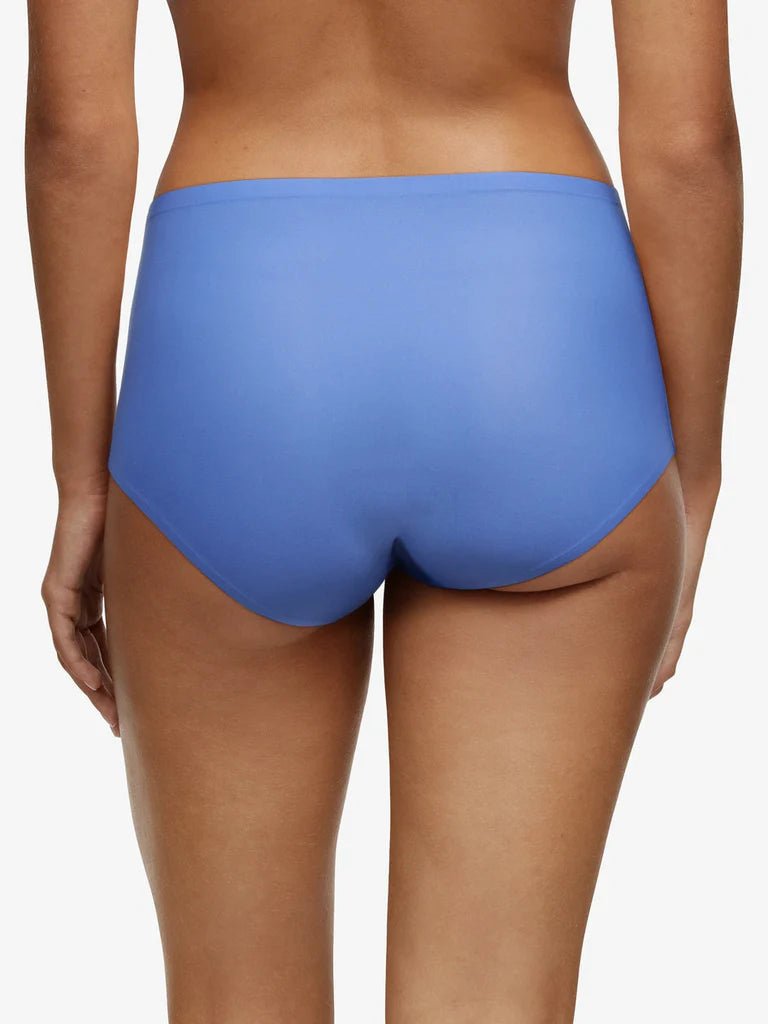 SoftStretch seamless full brief in Antoinette Blue by Chantelle shown on model, high-waisted design with full bottom coverage – available at The Foundation.
