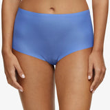 SoftStretch seamless full brief in Antoinette Blue by Chantelle shown on model, high-waisted design with full bottom coverage – available at The Foundation.