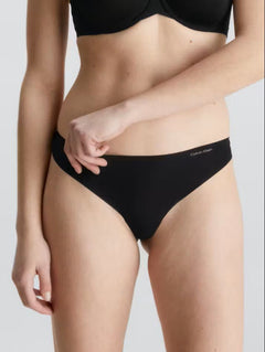 Front view of Calvin Klein Invisibles Thong Black, a seamless microfibre thong with a smooth, invisible fit.