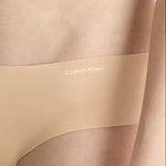 Side view of Calvin Klein Invisibles Hipster Light Caramel, showing soft microfibre fabric and medium rise waist.