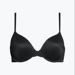 Calvin Klein Perfectly Fit T-Shirt Bra Black laid flat, highlighting seamless microfibre fabric, moulded cups, and underwire design.