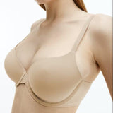 Close-up of Calvin Klein Perfectly Fit T-Shirt Bra Bare in nude, featuring seamless moulded cups, adjustable straps, and underwire support.