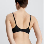 Back view of Liquid Touch Push Up Plunge Bra in Black by Calvin Klein—adjustable straps and hook closure shown, available at The Foundation.