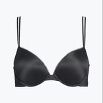 The Foundation’s Calvin Klein Liquid Touch Bra—flat lay showing sculpted cups, lace trim, and supportive plunge silhouette.