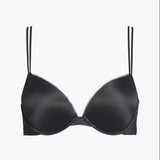 The Foundation’s Calvin Klein Liquid Touch Bra—flat lay showing sculpted cups, lace trim, and supportive plunge silhouette.