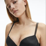 Front view of Calvin Klein’s Liquid Touch Push Up Plunge Bra in Black from The Foundation—plunge neckline with luxe microfibre and lace trim.