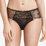 The Foundation’s Chantelle Waltz Shorty Brief in black – mid-rise lace brief with semi-sheer floral design and scalloped trims for feminine flair.