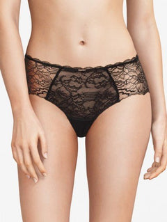 The Foundation’s Chantelle Waltz Shorty Brief in black – mid-rise lace brief with semi-sheer floral design and scalloped trims for feminine flair.