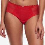 Front view of The Foundation’s Waltz Shorty Brief in Bright Poppy – featuring mid-rise semi-sheer floral lace with scalloped edges for feminine charm.