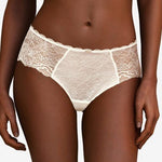 The Foundation's Chantelle Waltz Shorty Brief in Milk – mid-rise ivory lace brief with floral semi-sheer design and flattering scalloped waistband.