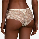 Back of The Foundation’s Waltz Shorty Brief in Milk – soft cotton gusset and sheer lace with delicate scalloped edge for a graceful silhouette.