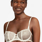 The Foundation’s Waltz Half Cup Bra in Milk – front view of delicate French Leavers lace with demi cups and a flattering uplifted neckline.