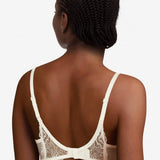 Back view of The Foundation’s Waltz Half Cup Balcony Bra in Milk – adjustable straps and supportive band with elegant floral lace detailing.