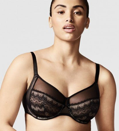 Model wearing the Chantelle Revele Moi 4 Parts Wire Bra in Black, featuring sheer mesh panels, full coverage cups, and supportive underwire design. front view