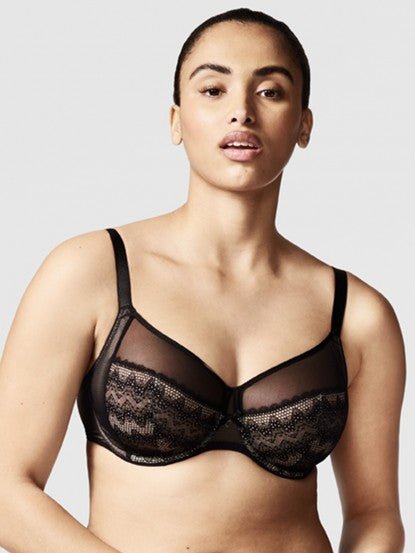 Model wearing the Chantelle Revele Moi 4 Parts Wire Bra in Black, featuring sheer mesh panels, full coverage cups, and supportive underwire design. front view