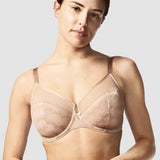 Model showcasing the Chantelle Revele Moi 4 Parts Wire Bra in Nubuck, featuring sheer mesh panels, vertical seams, and full coverage for everyday support. front view