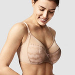 Model showcasing the Chantelle Revele Moi 4 Parts Wire Bra in Nubuck, featuring sheer mesh panels, vertical seams, and full coverage for everyday support. side view