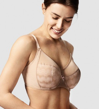 Model showcasing the Chantelle Revele Moi 4 Parts Wire Bra in Nubuck, featuring sheer mesh panels, vertical seams, and full coverage for everyday support. side view