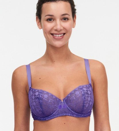Model wearing Chantelle Day to Night Half Cup Bra in Veronica purple with demi shape, refined Lycra lace, and adjustable straps for a lifted look. front view